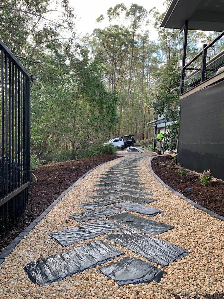 A foot path made from stone in a hardscaping project