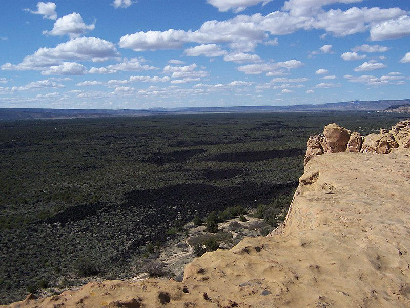 A view of a desert landscape from el malpais national monument