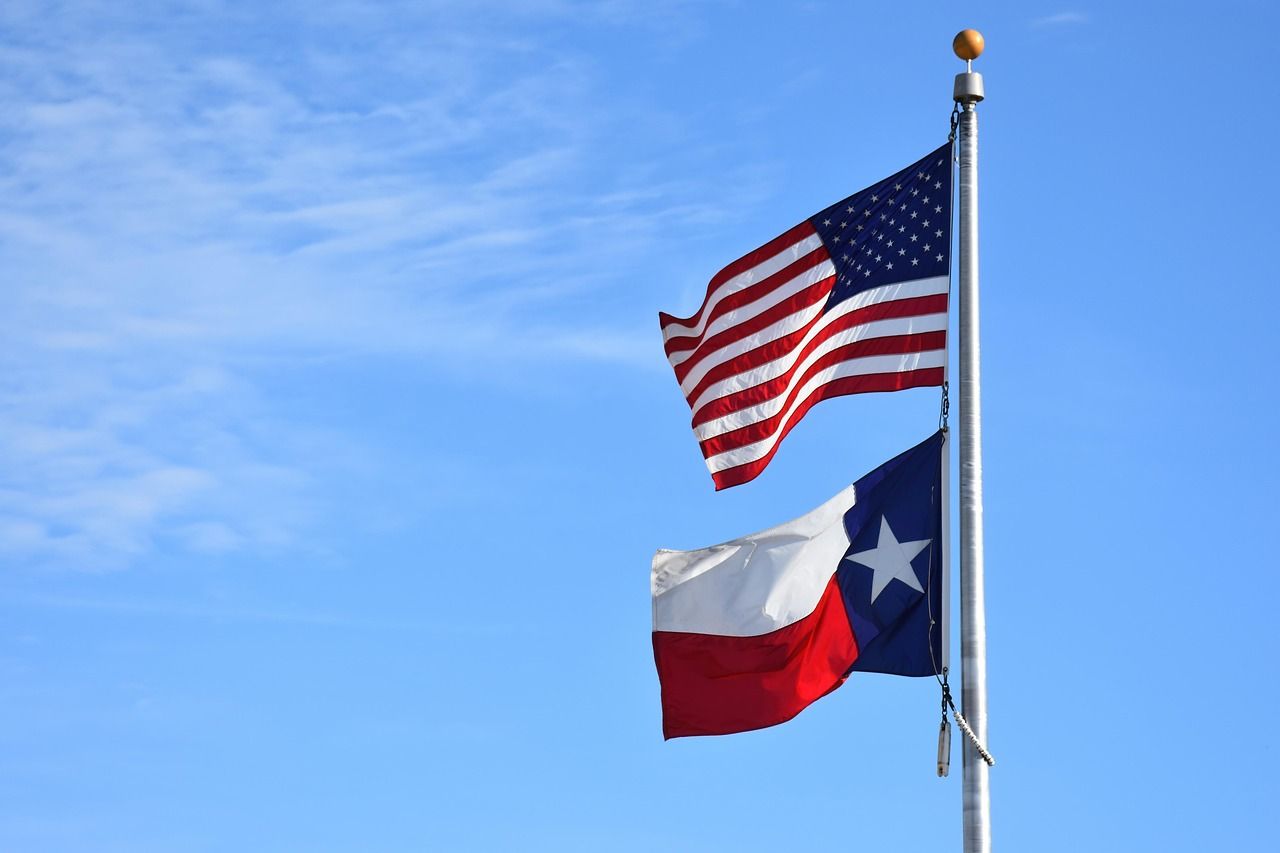 The Texas and United States flags