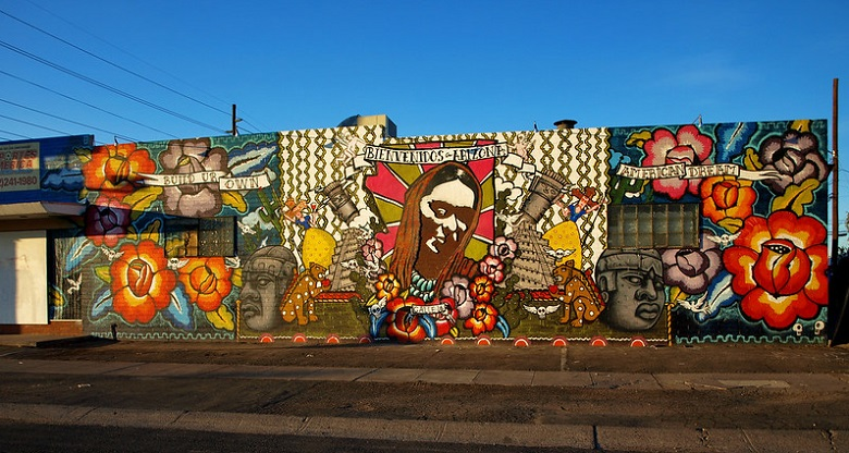 A large mural on the side of a building on roosevelt row