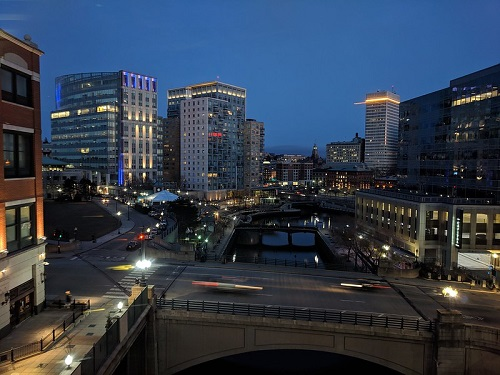 A bridge over a river in Providence at night