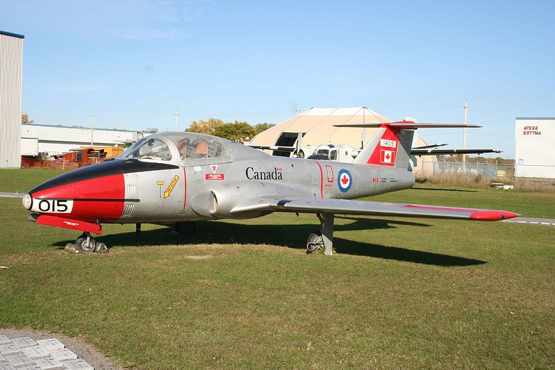 A grey and red Canadian airplane at the National Air Force Museum Of Canada