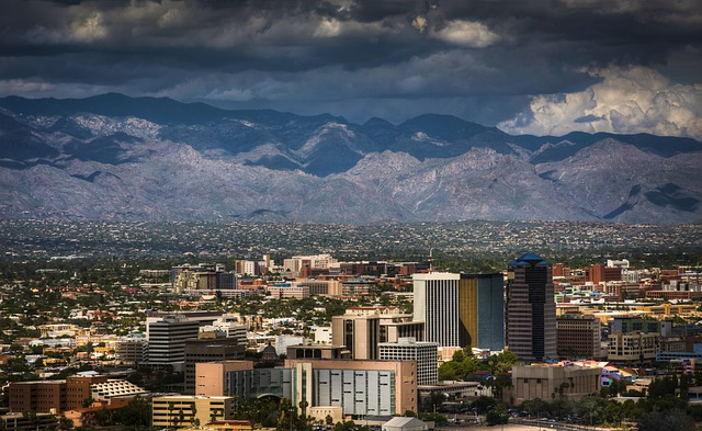 An aerial view of Tucson, AZ with mountains in the background