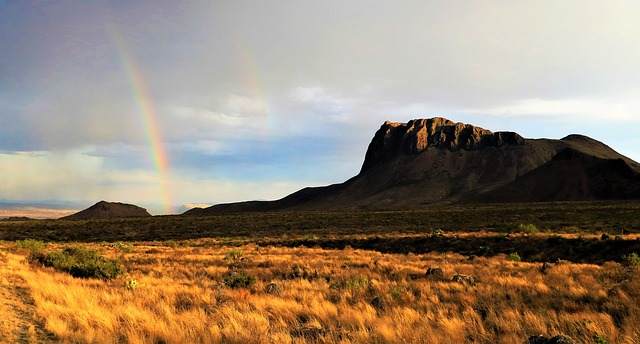 A rainbow is visible over Big Bend National Park