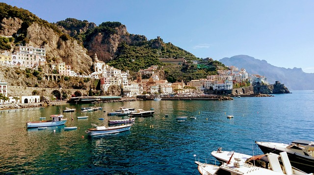 A group of boats are docked in Amalfi Coast, Italy