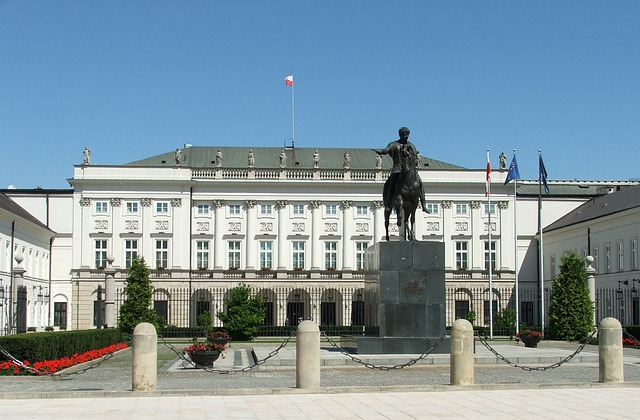 A statue of a man on a horse in front of the presidential palace