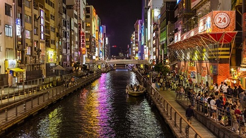 A boat is going down a river in the Osaka Namba District
