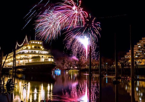 A fireworks display over the river in Sacramento