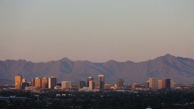 The phoenix skyline with mountains in the background at sunset.