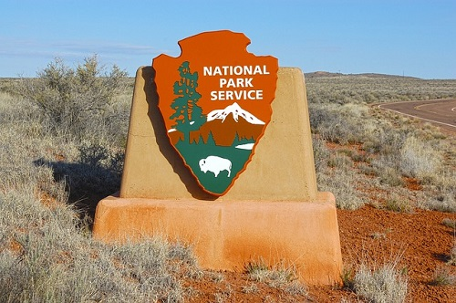 A national park service sign in the desert