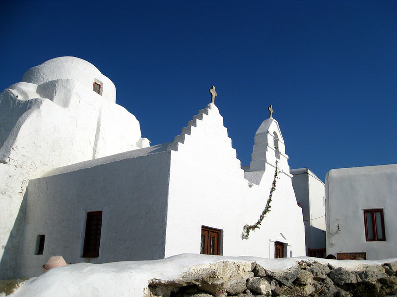 the Paraportiani Orthodox Church with a cross on top of it