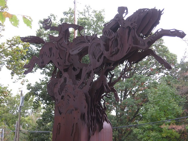 A large metal sculpture of the Headless Horseman