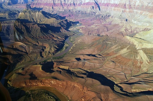 An aerial view of the grand canyon with a river running through it