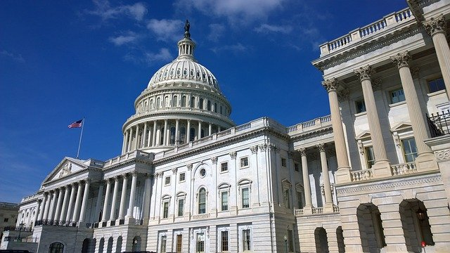 The Capitol building in Washington d.c. is a large white building with a dome.