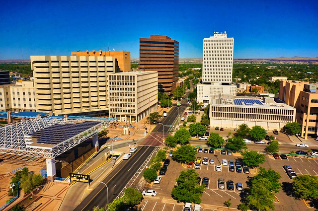 An aerial view of Albuquerque with a lot of buildings and trees