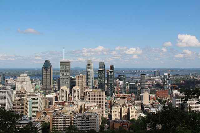 An aerial view of quebec city with lots of tall buildings