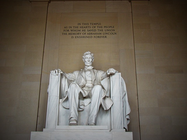 A statue of Abraham Lincoln sitting in a chair in Washington D.C