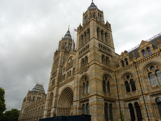 A large building with a clock tower on top of it in London.