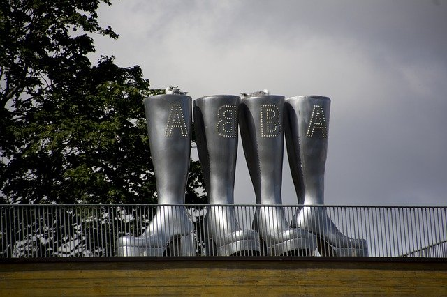 A row of silver boots outside the ABBA museum