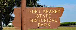 A wooden sign for fort kearny state historical park