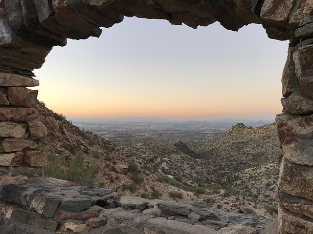 A view of a valley through Hole In The Rock near Phoenix