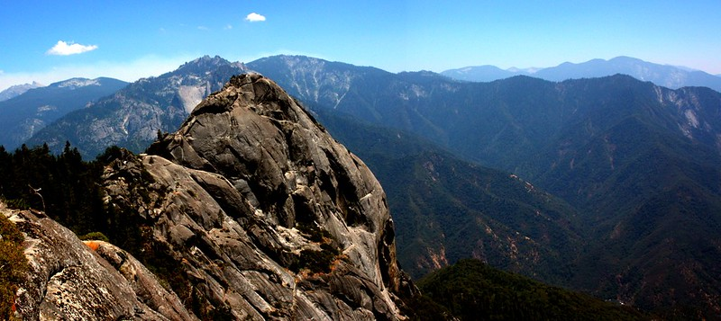 A mountain range with a large rock in the foreground in sequoia np