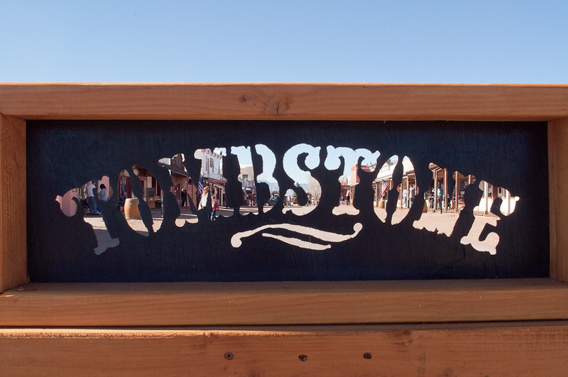 A wooden sign that says tombstone on it