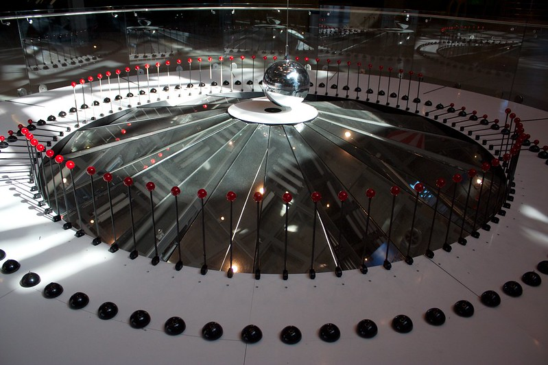 A circular display with a ball in the middle in the Copernicus Science Centre