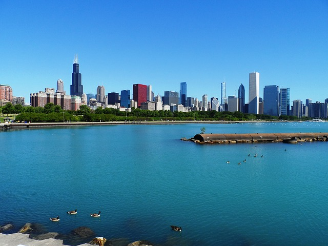 A city skyline with lake michigan in the foreground