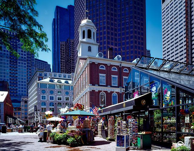 A historic building with a bell tower in the middle of Boston