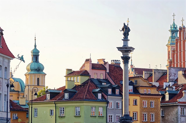 an aerial view of warsaw old town with a statue of a man on top of a pole in the middle of it.