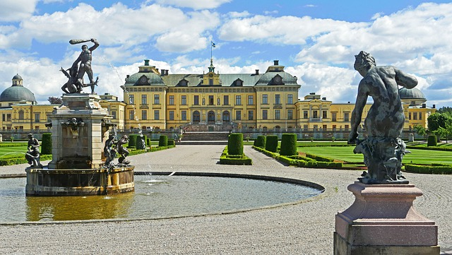 A large building with a fountain in front of it in stockholm