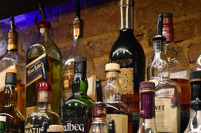 A bunch of bottles at The Scotch Whisky Experience