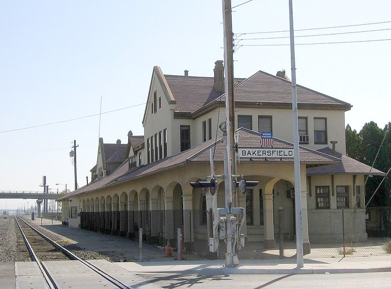 A train station with a sign that says Bakersfield