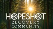 HopeShot Recovery Community logo over sunlit forest with rays shining through trees