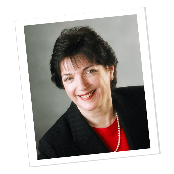 Kathy Bernhard's Professional headshot . She is smiling in business attire.