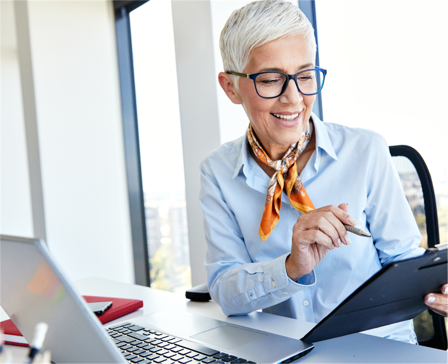 female senior business leader at her desk