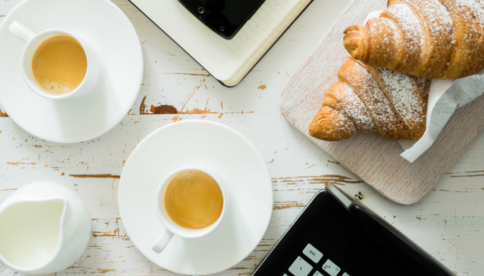 picture of catered business meeting with pastries and coffee
