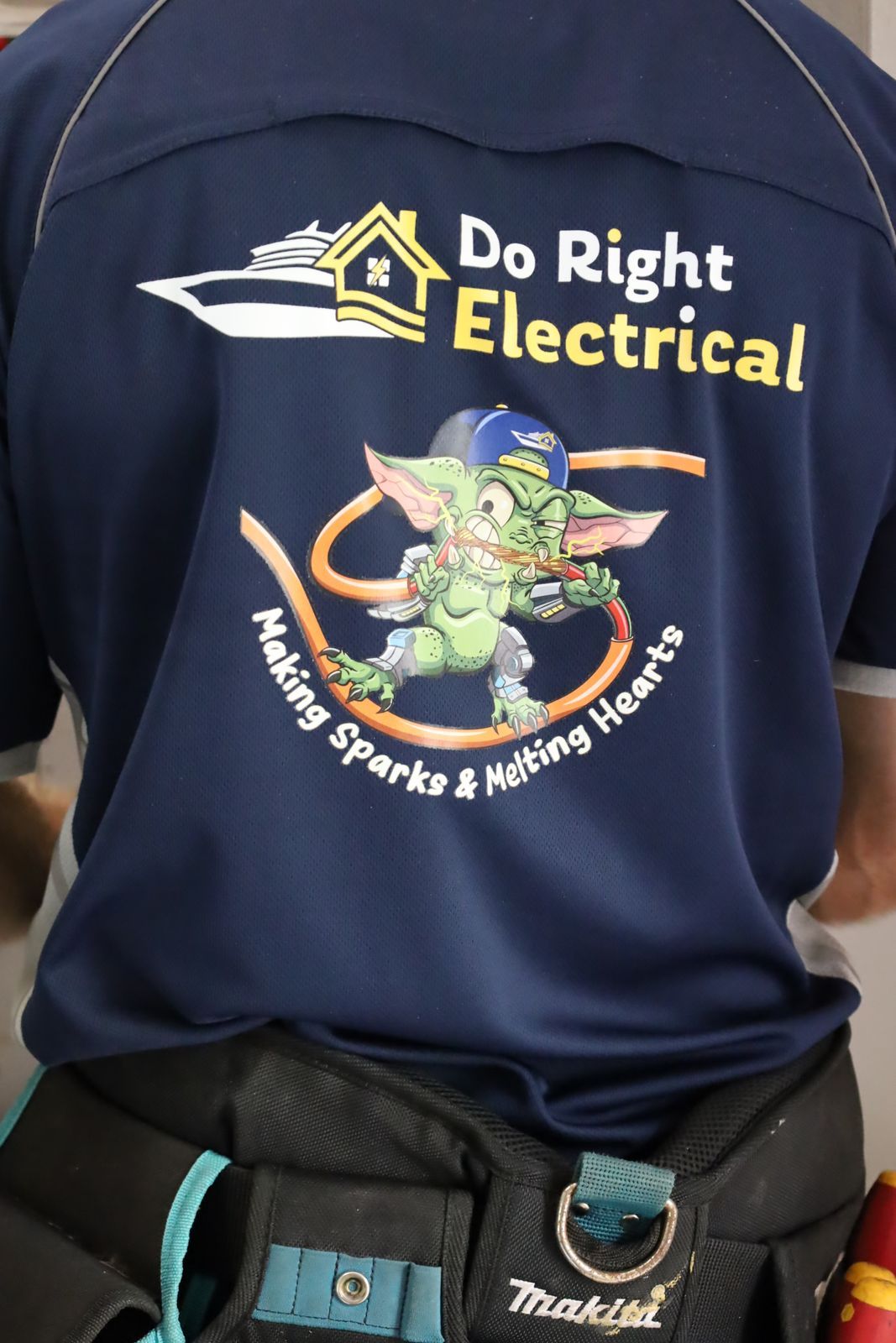 Person Wearing Gloves Using a Voltage Tester — Do Right Electrical in Redlynch, QLD