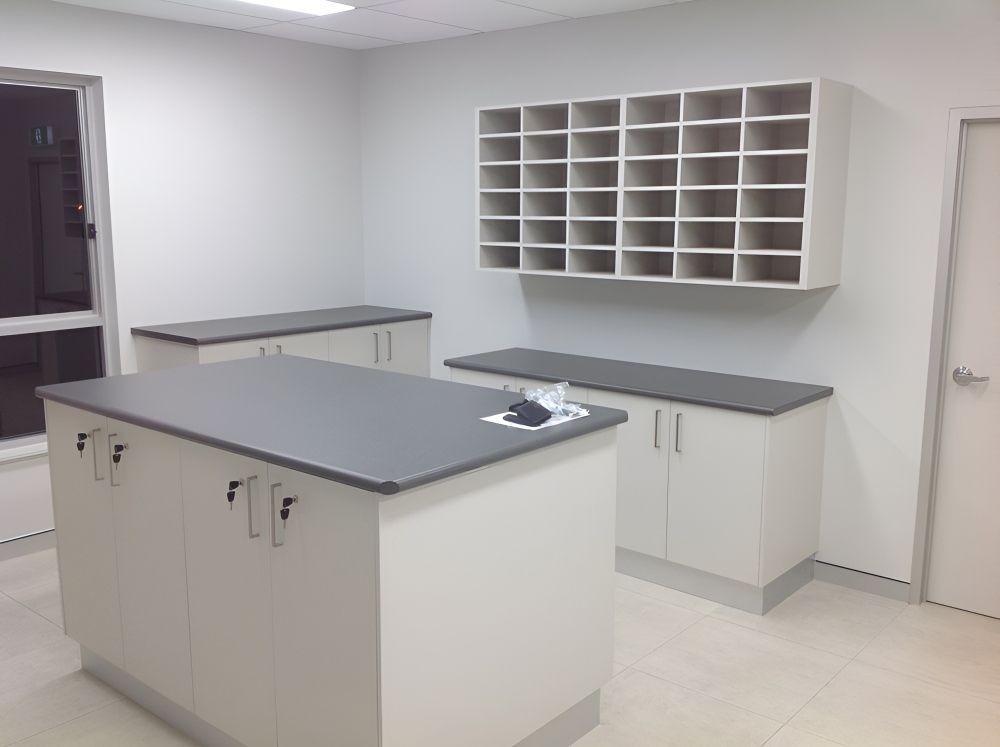 A Kitchen With A Large Island And Lots Of Shelves — Gavin Cummings Kitchens in Condobolin, NSW