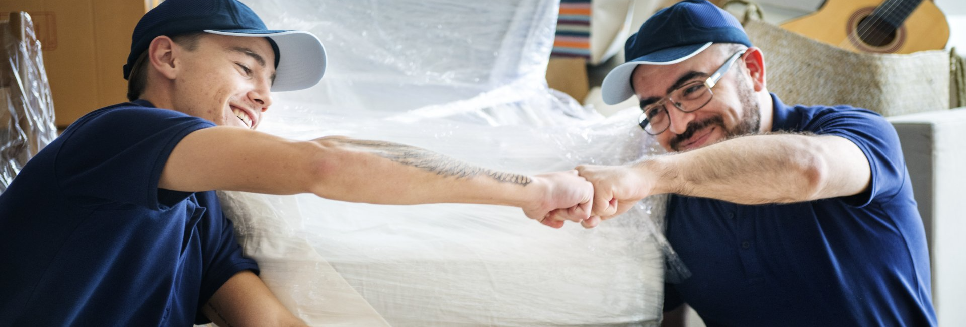 stock photo of 2 workers bumping fists