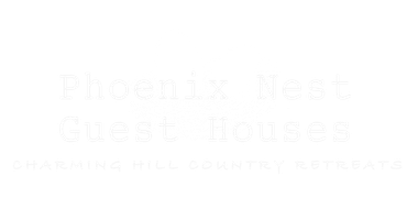 A white background with the words `` phoenix nest guest houses '' written on it.