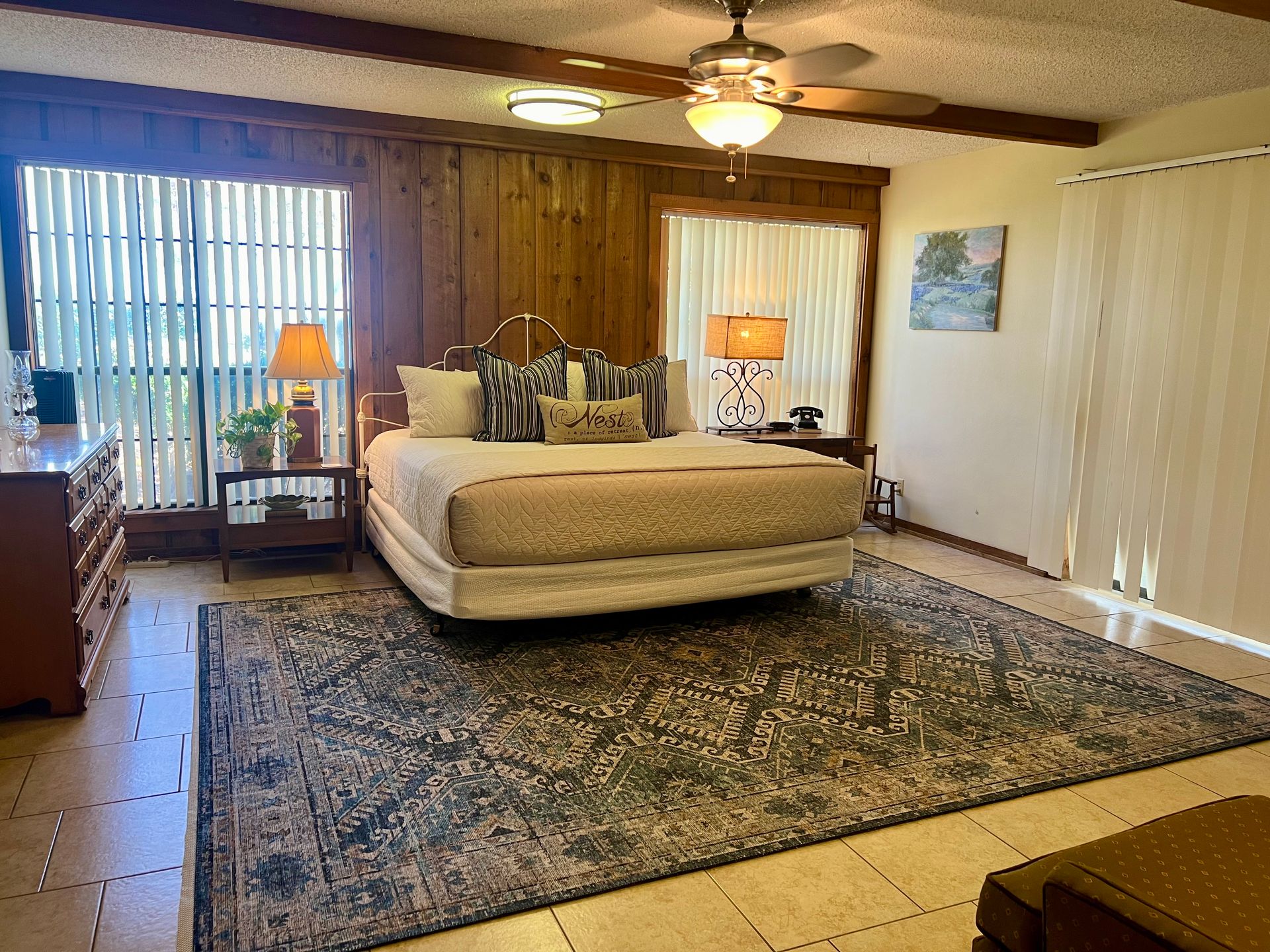 There is a large bed in the middle of the room.