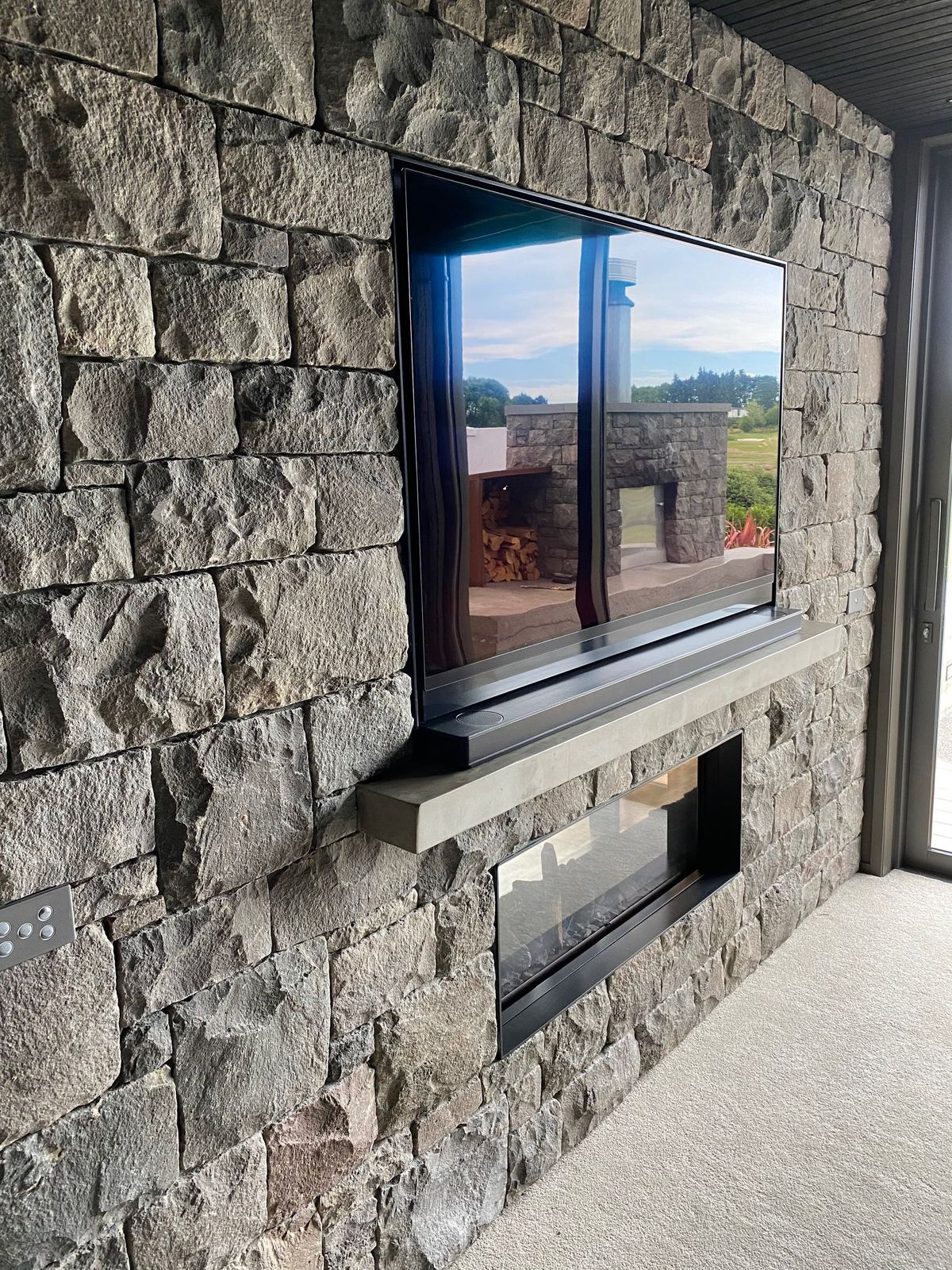 stonemason utilized local oxford grey stone and stoneclad
