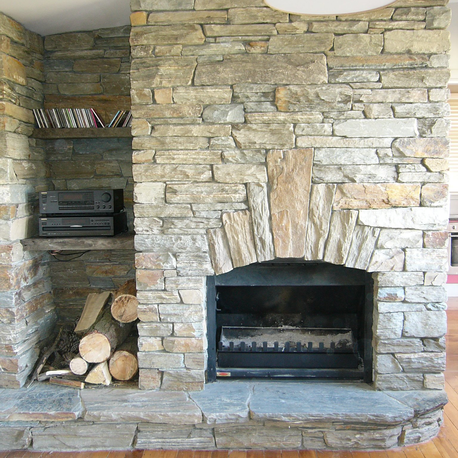 schist fireplace with keystone