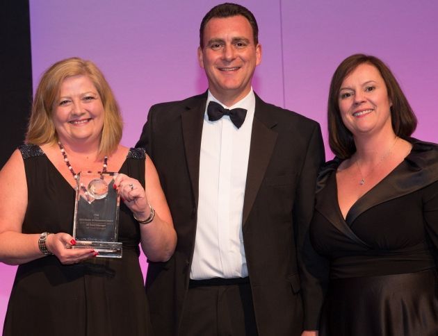 Huw Edwards presenting me with my ITM award