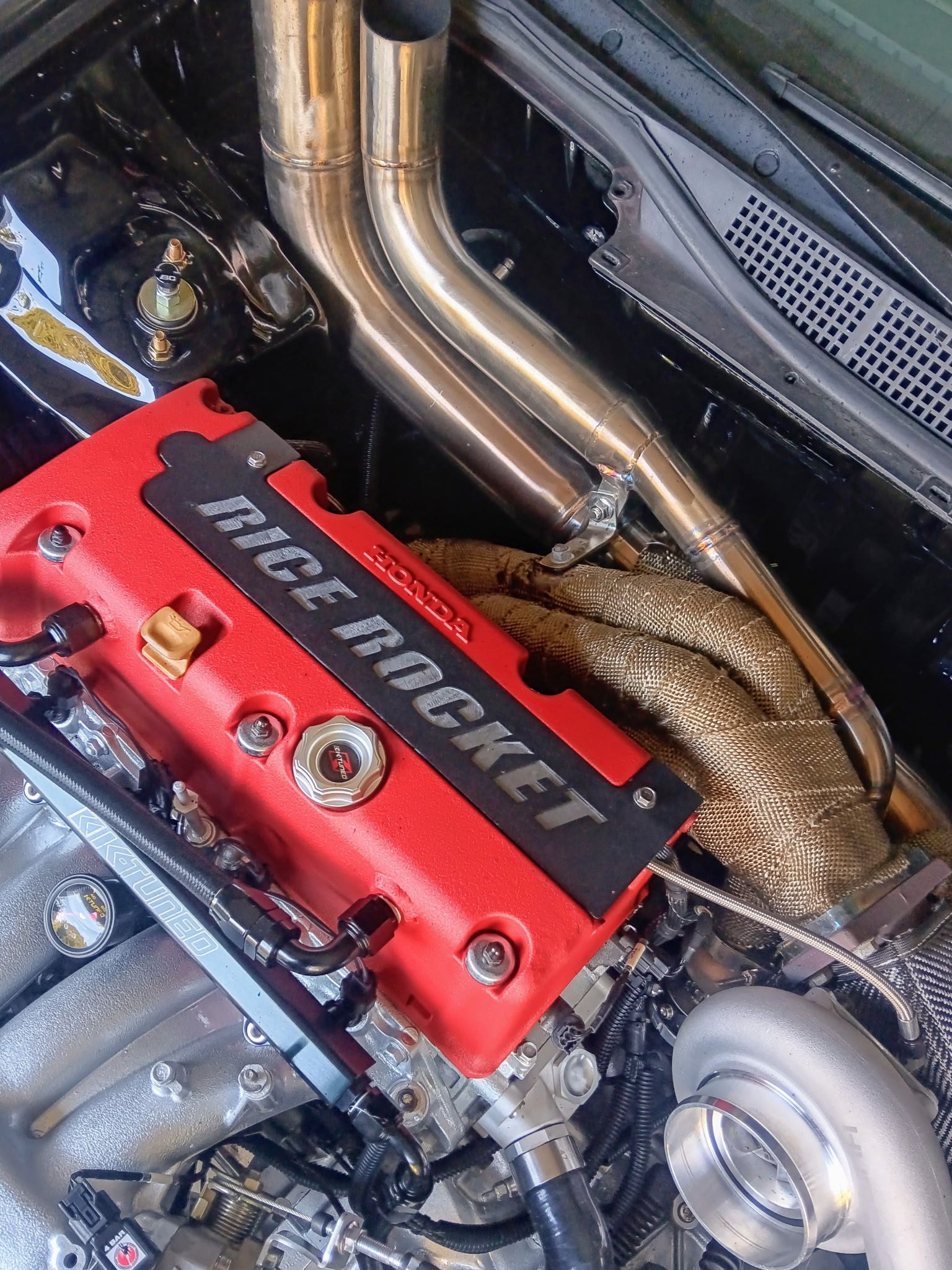 Red engine cover labeled