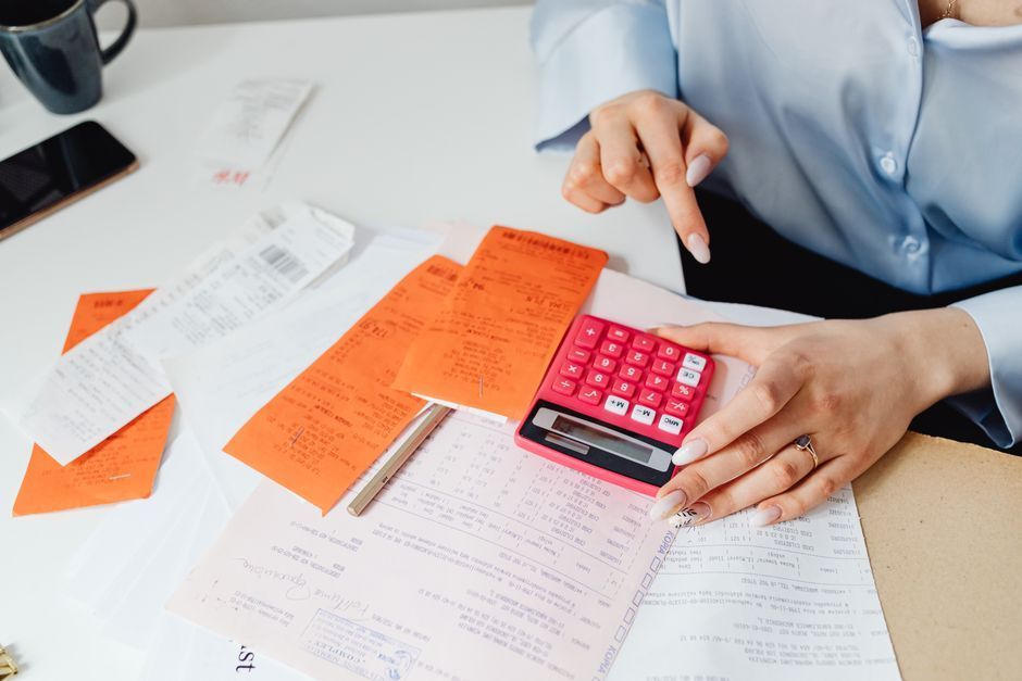Receipts and paperwork on a desk, ready for an insurance claim