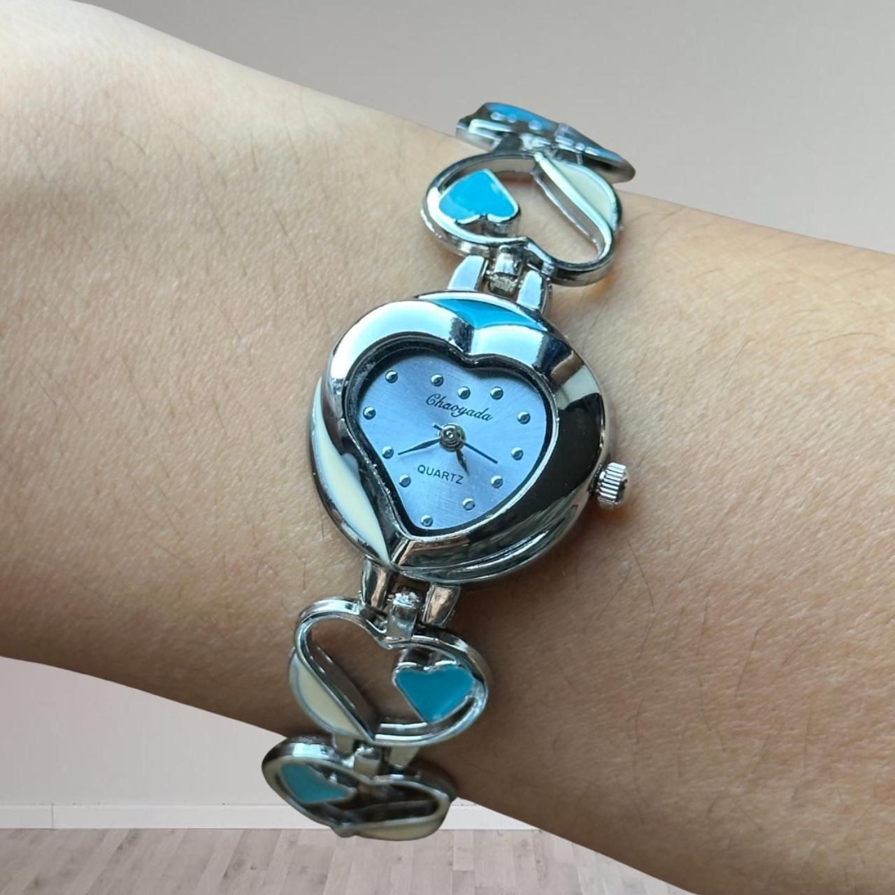 silver and blue heart watch