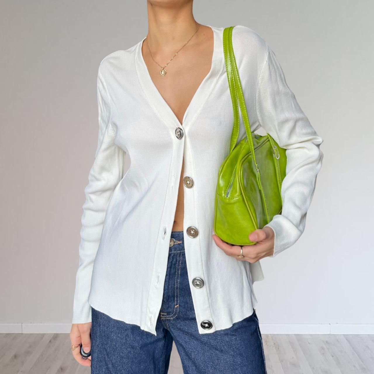 white cardigan with metal buttons
